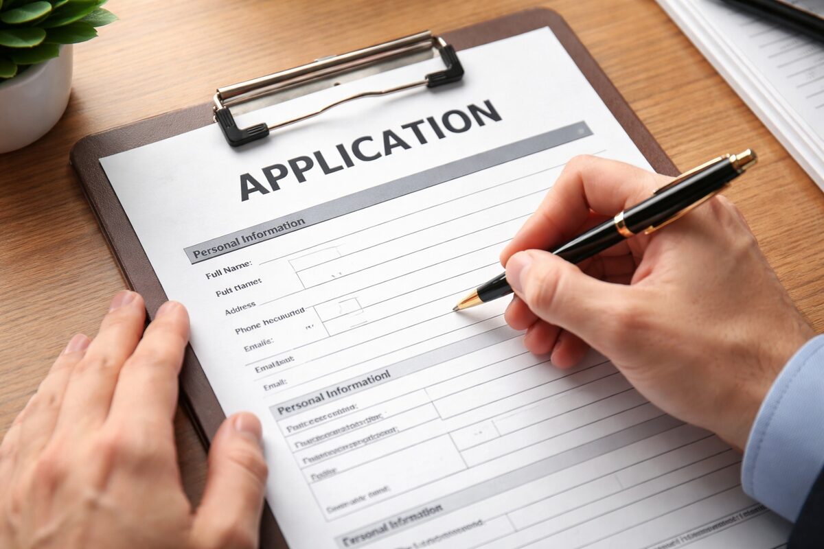 file image of a man filling out an application