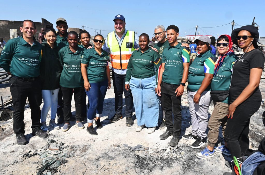 Hill-Lewis with Gift of the Givers volunteers