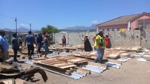 Shack-fire victims thrilled at receiving new building materials