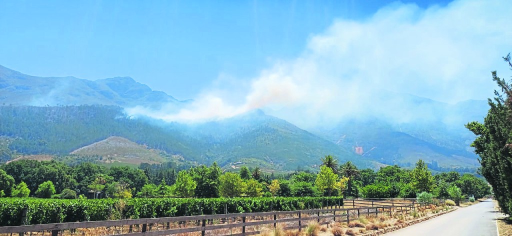 Firefighting teams battle an out-of-control blaze in Langrug, Franschhoek.