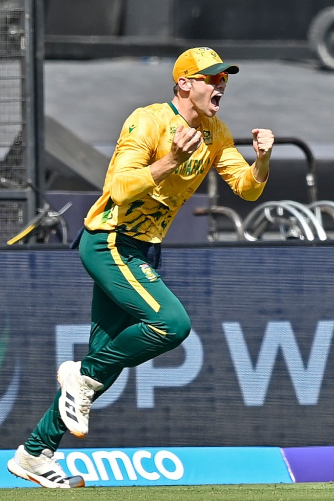 South Africa's Tristan Stubbs celebrates after taking a catch to dismiss Afghanistan's Azmatullah Omarzai during the 2026 ICC Men's T20 Cricket World Cup group stage match between Afghanistan and South Africa at the Narendra Modi Stadium in Ahmedabad on February 11, 2026.