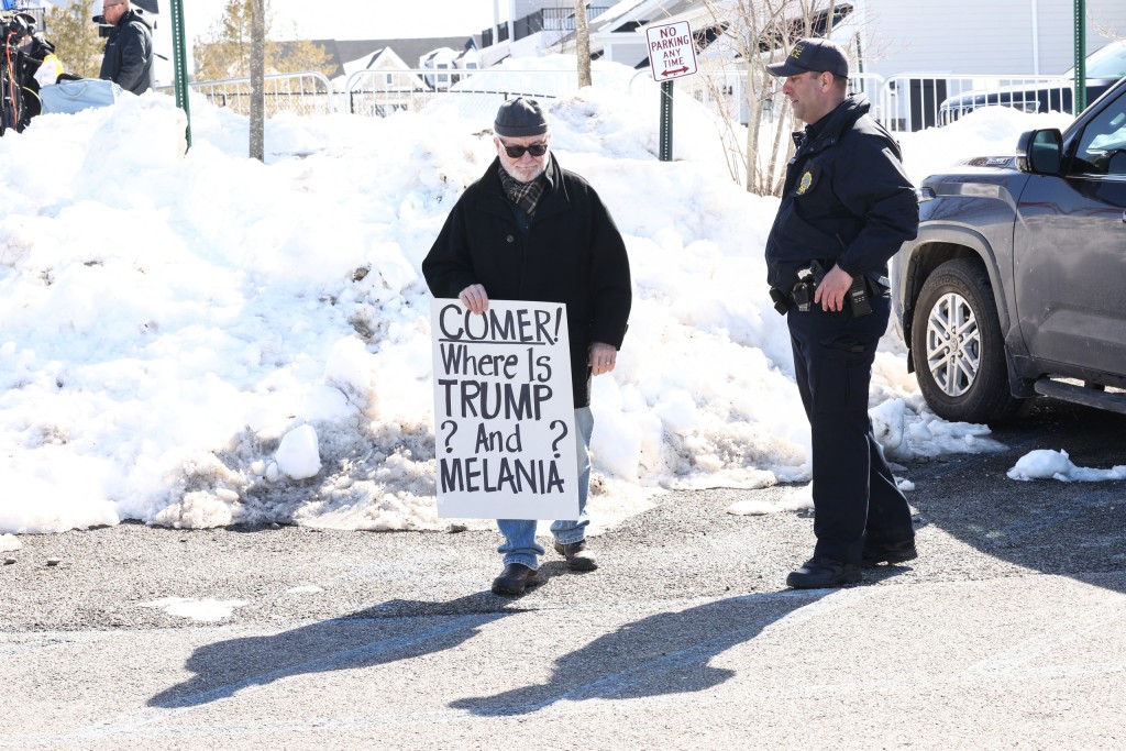 A police officer asks a protestor to leave. Photo: Charly Triballeau / AFP