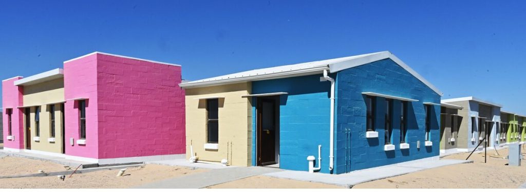These colourful houses were among the 26 new houses that were handed over.