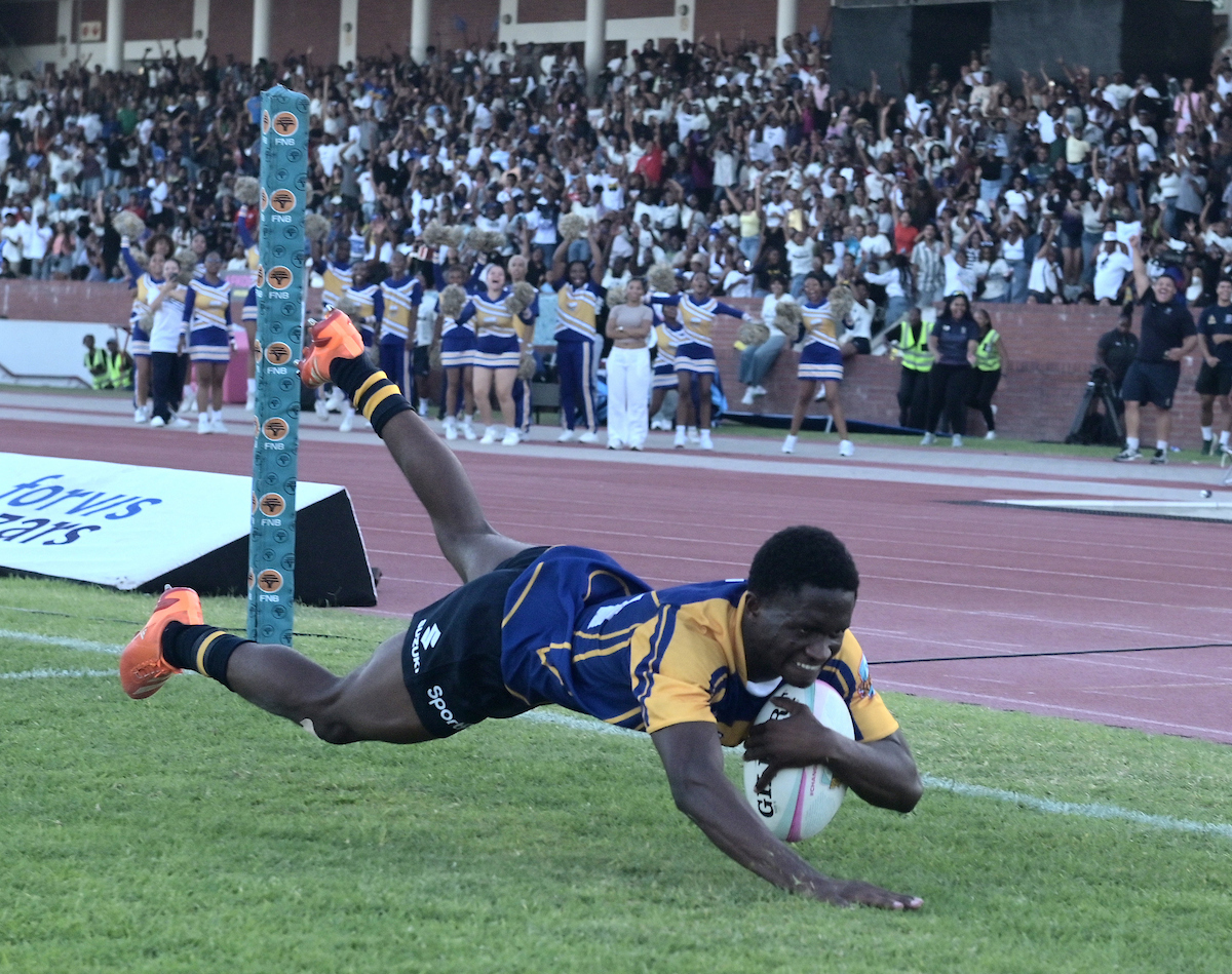 Juma Amisi of UWC scores a try during the 2026 Varsity Shield match between UWC and CPUT