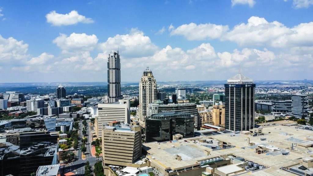 Sandton, similar to Stellenbosch, is also home to major corporate headquarters and multinational firms. Photo: Jolame Chirwa/Unsplash