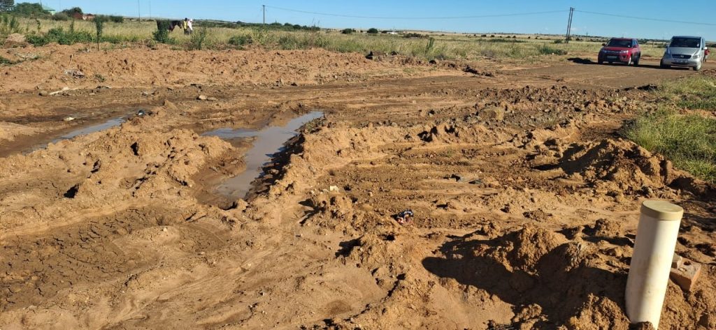 The Phomolong project came to an abrupt halt, leaving roads excavated, stormwater systems incomplete, and residents exposed to severe flooding