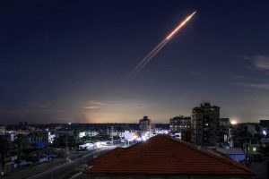 Fearful African migrants warily work on through Gulf missile strikes