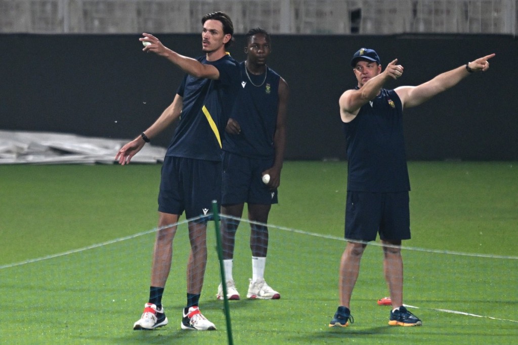 South Africa's Marco Jansen(L) gestures during a training session on the eve of their 2026 ICC Men's T20 Cricket World Cup semi final match against New Zealand at the Eden Gardens