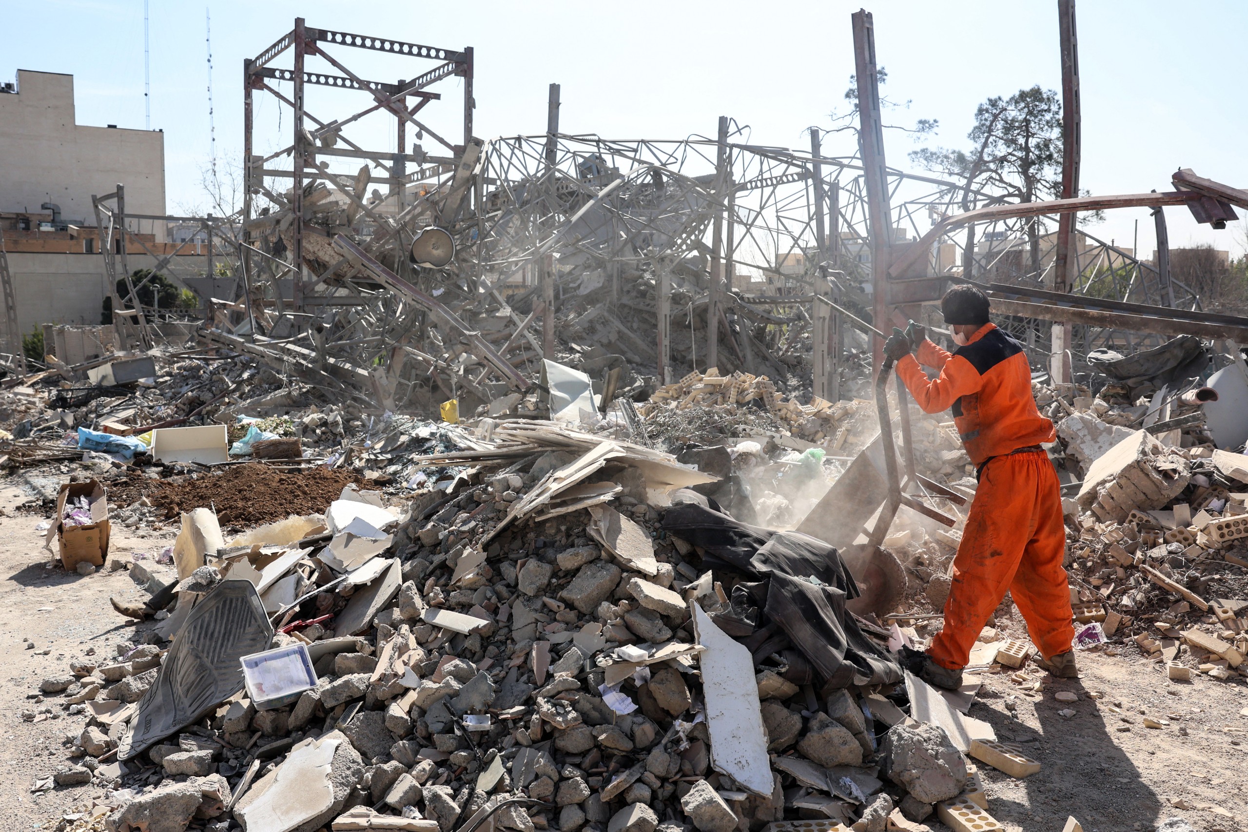 Iran's Revolutionary Guards said Wednesday they had total control of the Strait of Hormuz, a key waterway for global energy transit, as Israel launched a new wave of strikes on the Iranian capital.