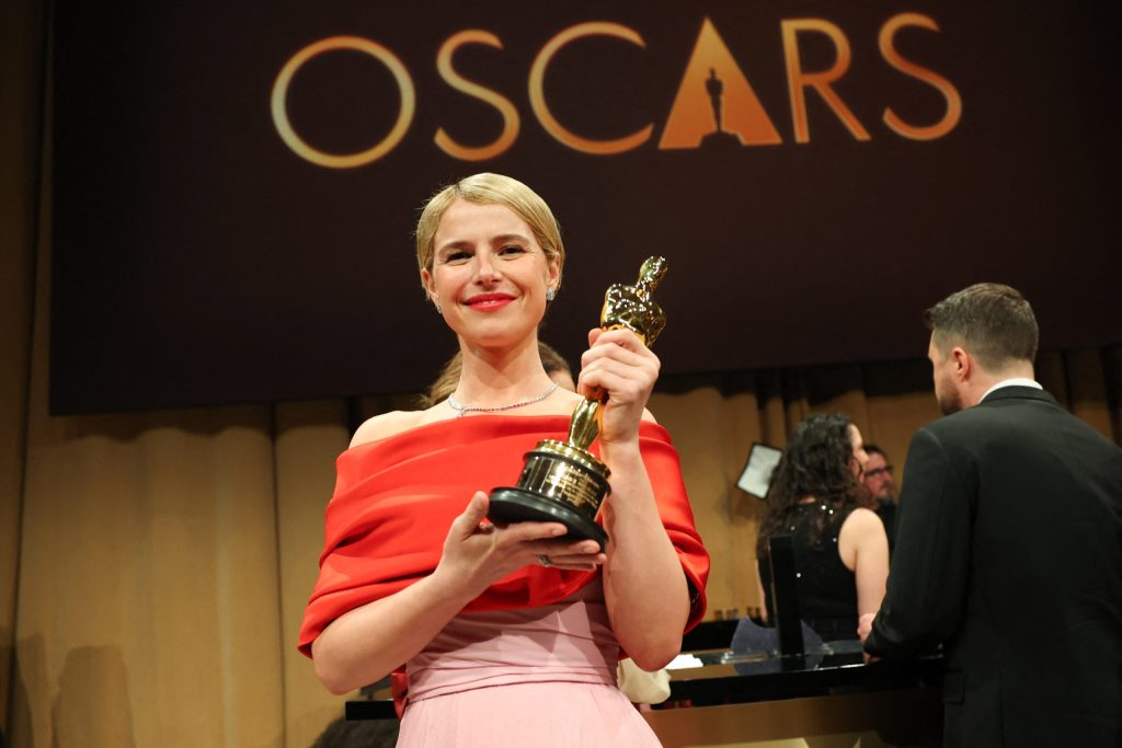 Irish actress Jessie Buckley holds her Oscar for Best Actress in a Leading Role for "Hamnet".
