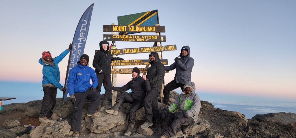 Talitha Oosthuizen with fellow-climbers at the summit of Mount Kilimanjaro.