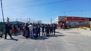 Bus torched as Phola Park residents protest against Red Ants