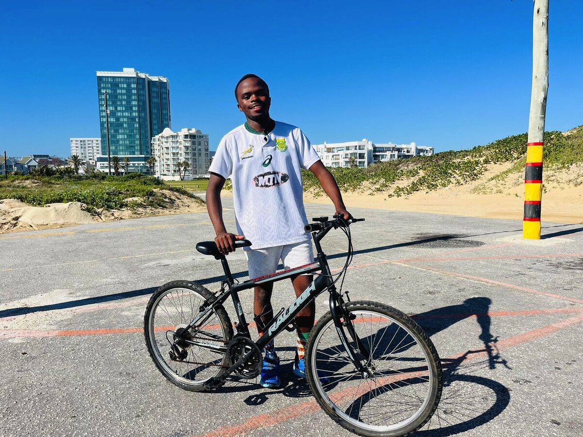 Mivuyo Qabo with his bicycle.