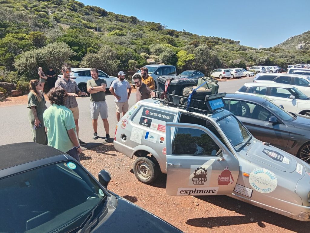 Admirers examine Sheila after @hold.mygear arrive at Cape Point.
