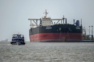 Iran warns of ceasefire violation as US plans to escort Hormuz ships