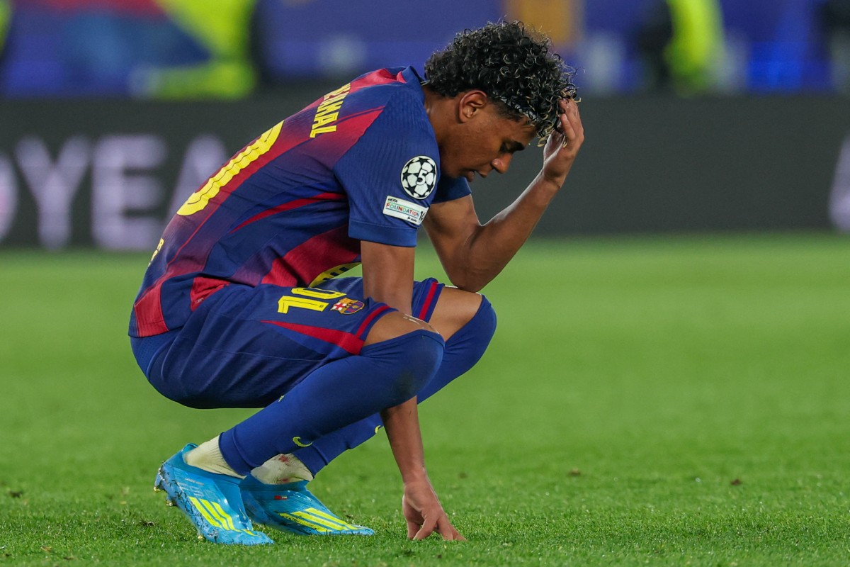 Barcelona's Spanish forward #10 Lamine Yamal reacts after the UEFA Champions League quarter final first leg football match between FC Barcelona and Club Atletico de Madrid