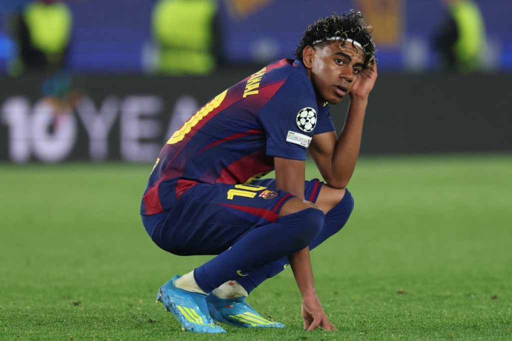 Barcelona's Spanish forward #10 Lamine Yamal reacts after the UEFA Champions League quarter final first leg football match between FC Barcelona and Club Atletico de Madrid