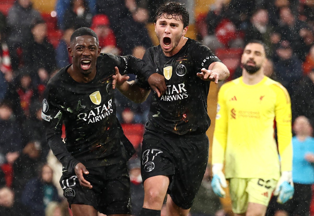 Paris Saint-Germain's French forward #10 Ousmane Dembele (L) celebrates scoring his team's second goal with Paris Saint-Germain's Portuguese midfielder #87 Joao Neves during the UEFA Champions League quarter final,