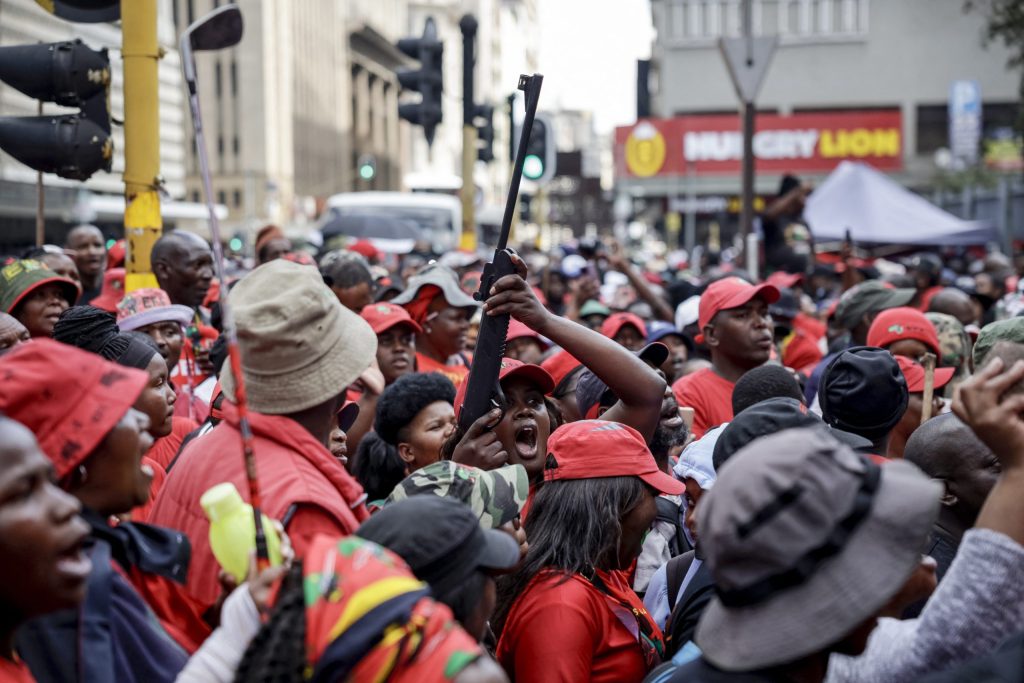 Malema was sentenced to five years' imprisonment by East London Regional Court magistrate Twanet Olivier for unlawfully possessing a firearm and discharging it in public during a 2018 EFF rally in Mdantsane. 