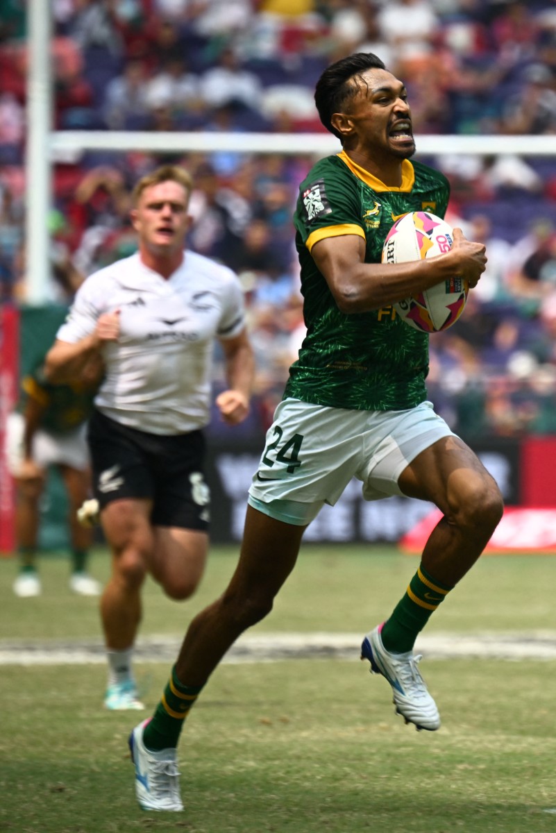 South Africa's Tristan Leyds heads to score a try during the Cup semifinals match between South Africa and New Zealand