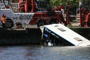Four rescued after bus plunges into Seine near Paris