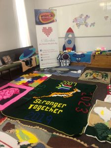 Women unite with needles for Mandela Day blanket drive