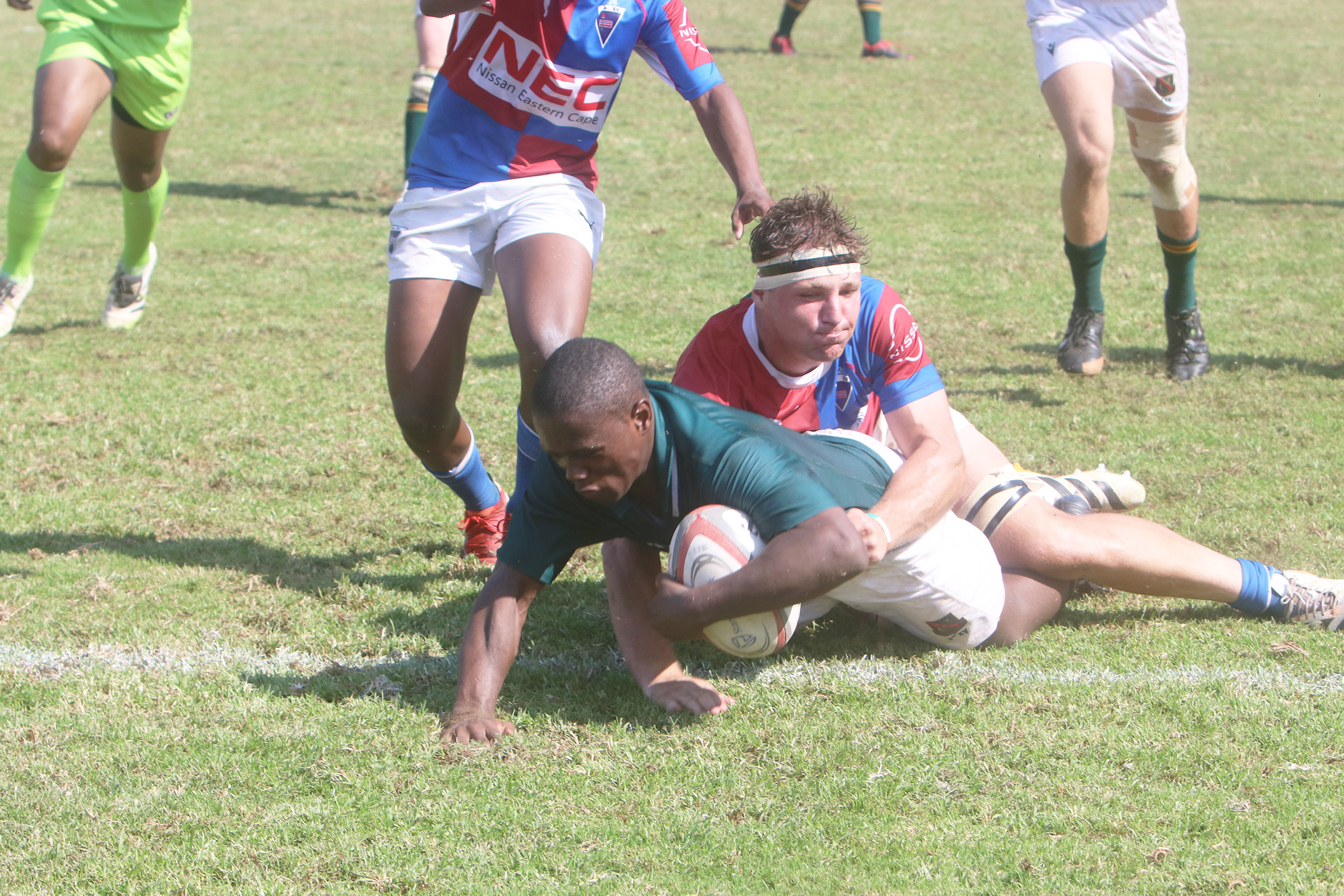 Glenwood flank Andile Mbokazi dots down in the game against Framesby