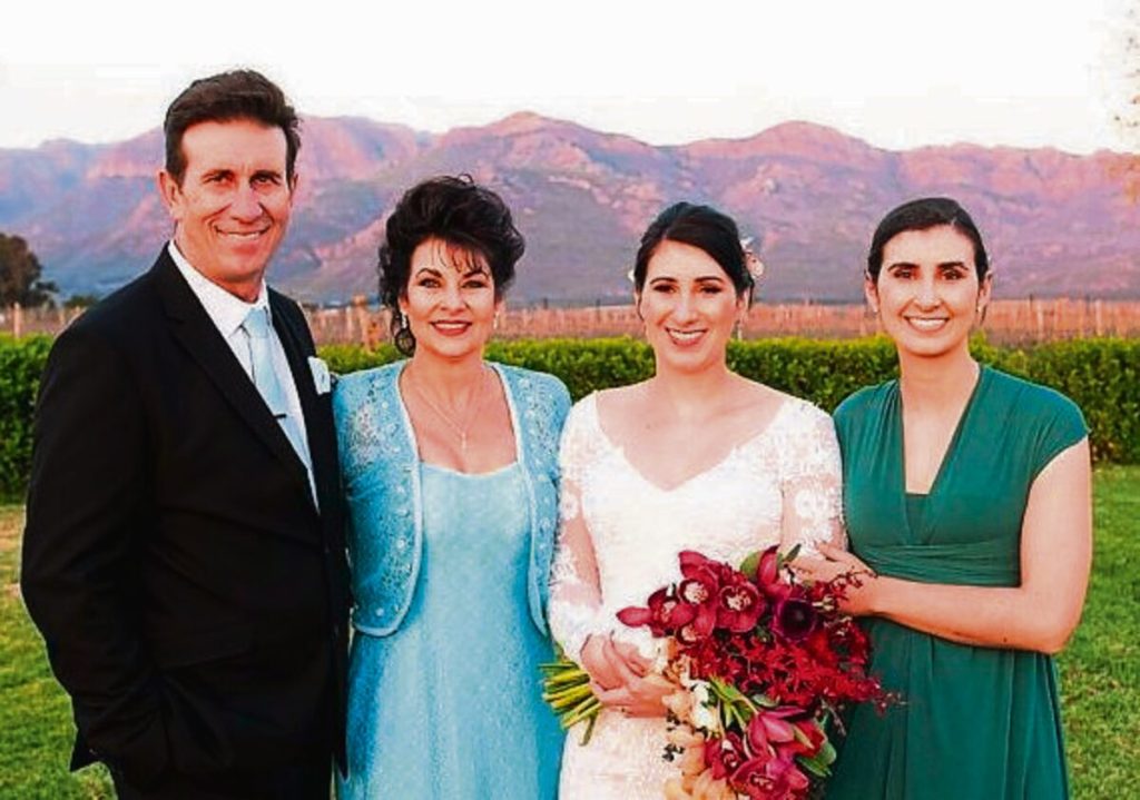 family, (from left) his wife, Elsie, and daughters, Joline Gardiner and Christie Britz.