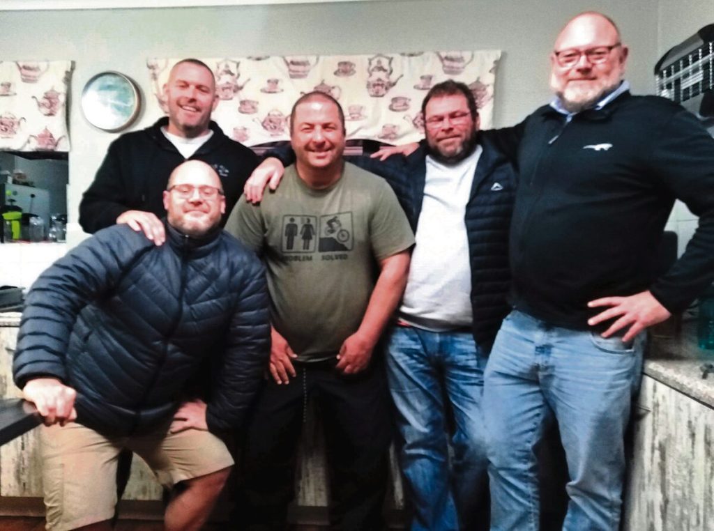 A few Barney's Army regular volunteers are here in the kitchen at Huis Andries Olivier. In (from left) are Rucus van der Merwe, Deon Nagel, Brent Malan and Nick Price. At the back is Shaun Smit.
