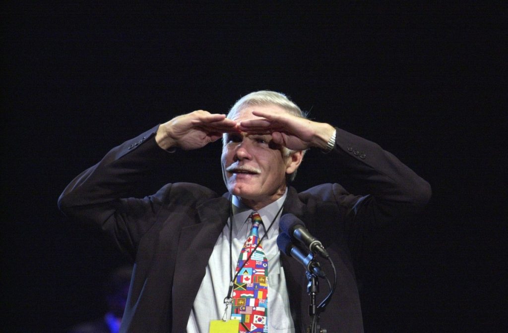 Ted Turner, founder of CNN, acknowledges the crowd during CNN's 20th Anniversary bash June 1, 2000 at Philips Arena in Atlanta, Georgia. Photo by Joey Ivansco / AFP