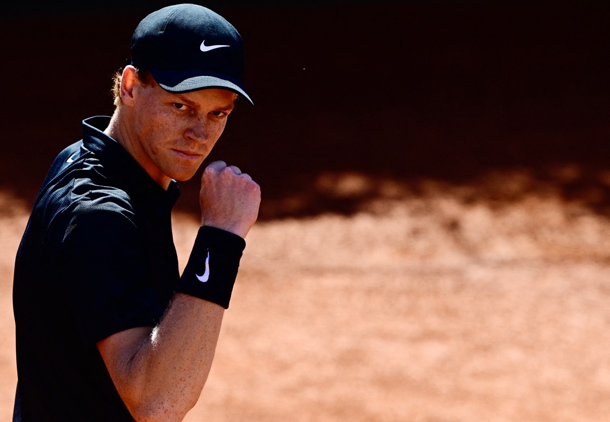 Italy's Jannik Sinner celebrates a point against Australia's Alexei Popyrin during the ATP Rome Open tennis tournament at Foro Italico in Rome