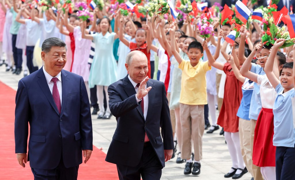 Putin, Xi hail 'unyielding' ties in talks after Trump visit