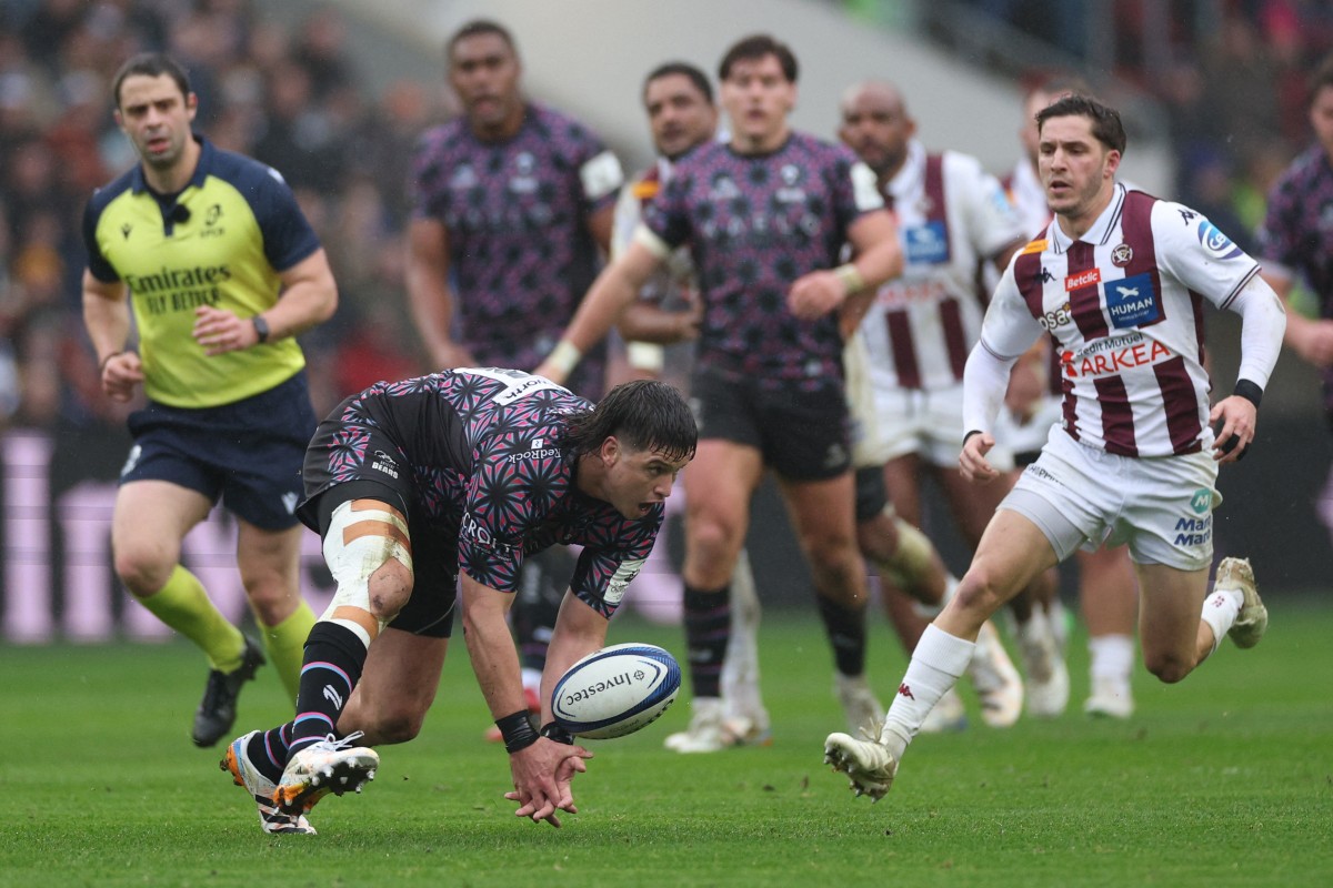 Bristol's South African centre Benhard Janse van Rensburg struggles to collect a loose ball during the European Champions