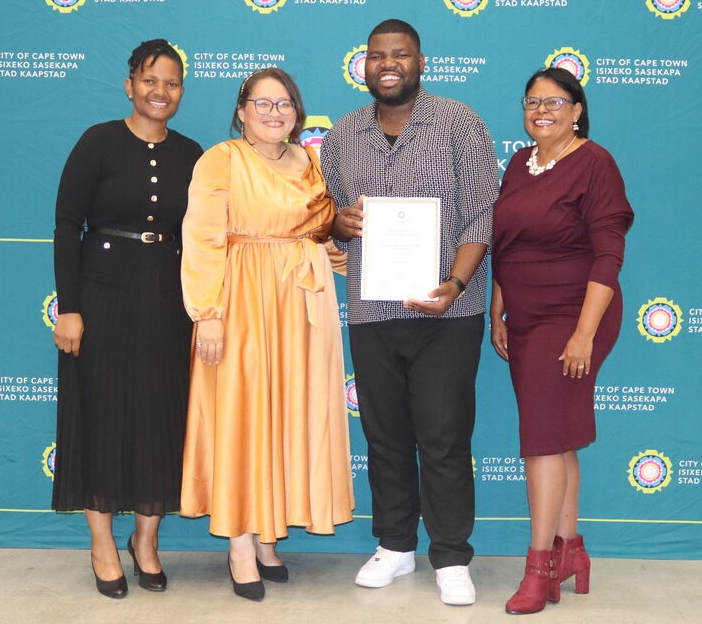 Yandisa Magagana receives his Civic Honours certificate for arts and culture contributions in Ward 86.