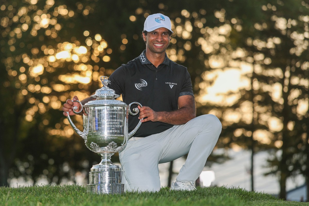 Aaron Rai of England celebrates with The Wanamaker Trophy after winning the 2026 PGA Championship at Aronimink Golf Club
