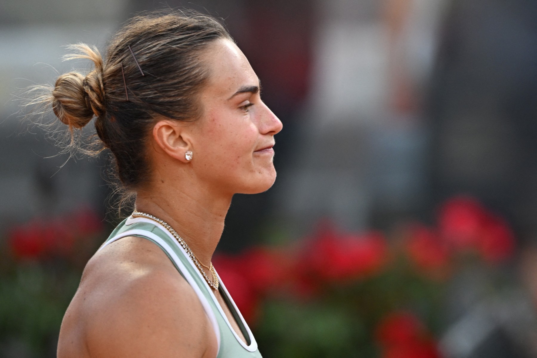 Belarus' Aryna Sabalenka reacts after being defeated by Romania's Sorana Cirstea