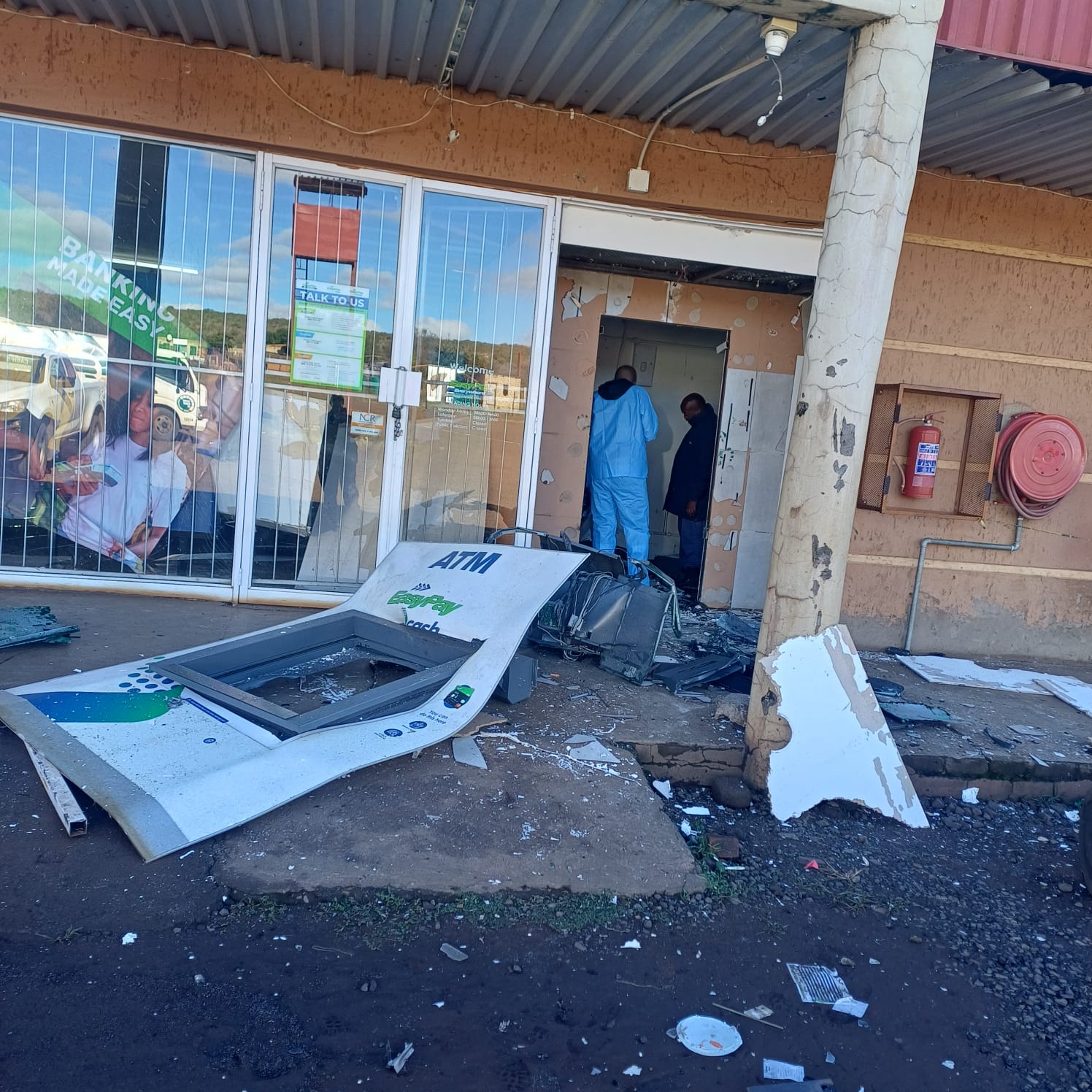 ATM bombing - five arrests.