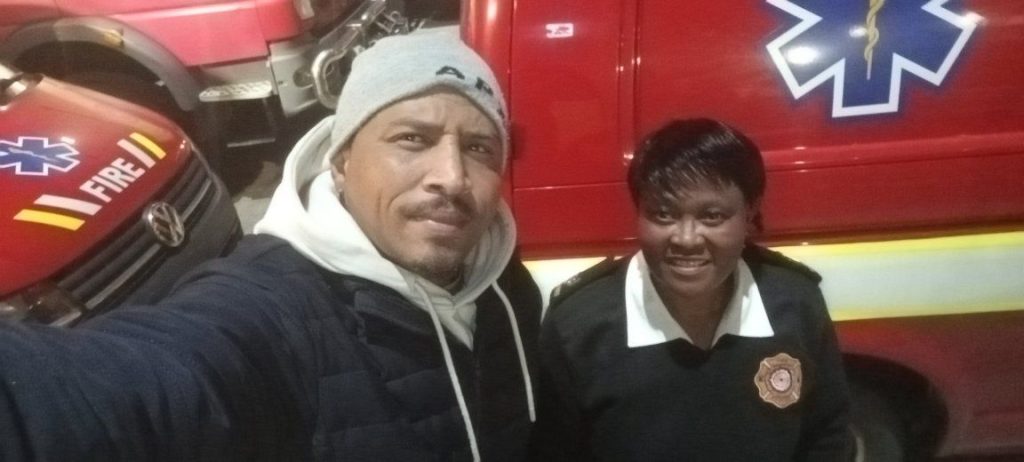 Nathan Gardiner (left) with Officer Pamela Zotwa.