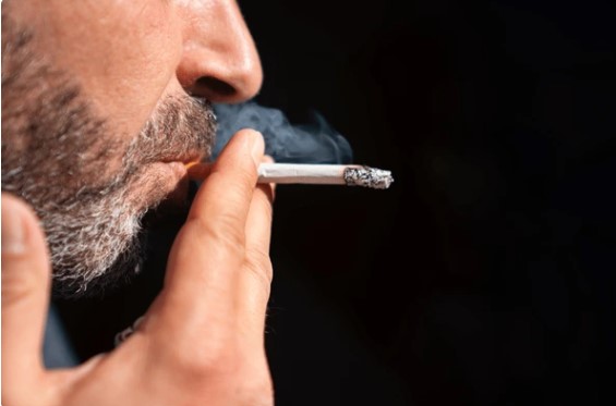 tobacco; man smoke a cigarette