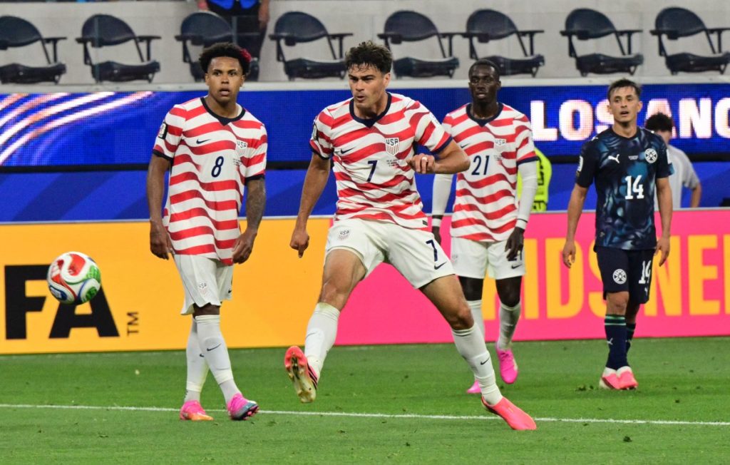 US midfielder Giovanni Reyna scores his team's fourth goal during Friday's match against Paraguay. 