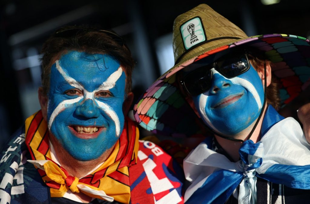 Scotland fans pose for pictures ahead of the 2026 World Cup Group C football match between Haiti and Scotland.