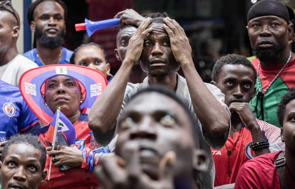 Haiti fans react while watching the 2026 FIFA World Cup match between Haiti and Scotland.