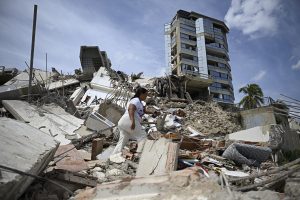 Key Venezuela port opens with US aid as burials begin