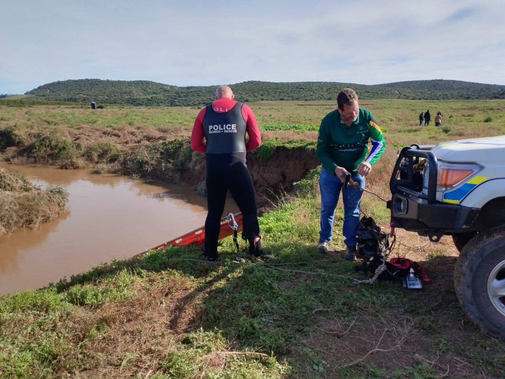 Community members who had been searching along the riverbank allegedly found the body.