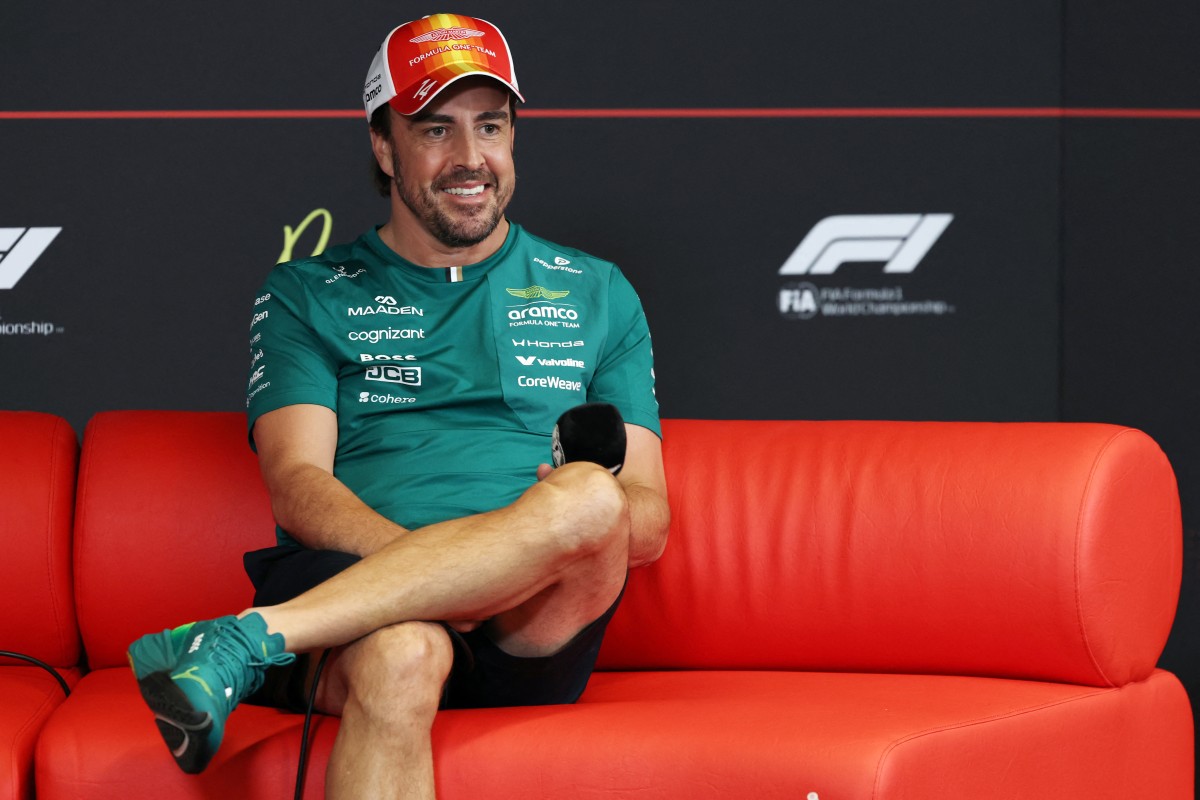 Fernando Alonso attends a press conference at the Circuit de Catalunya