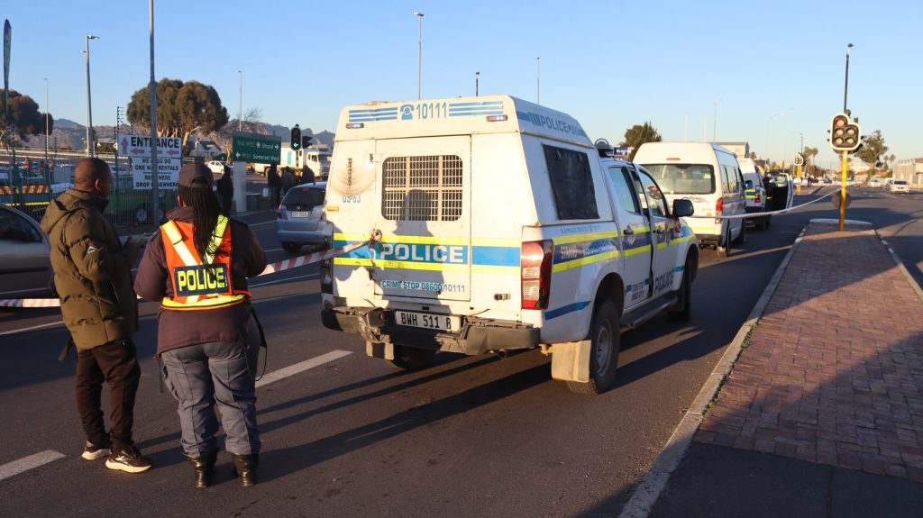 Lt Col Rulwa at scene where two security guards were shot in minibus taxi in Strand