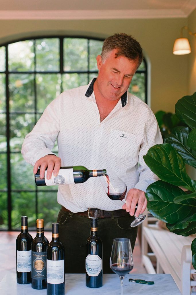 Luke O'Cuinne, head winemaker at Vergelegen, pouring Mill Race Red 2022 from the Heritage Range.