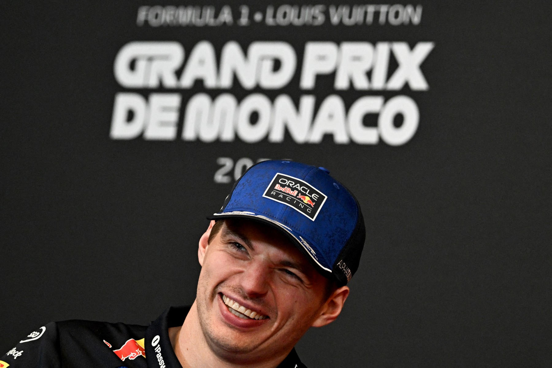 Red Bull Racing's Dutch driver Max Verstappen reacts as he attends the drivers' press conference at the Circuit de Monaco