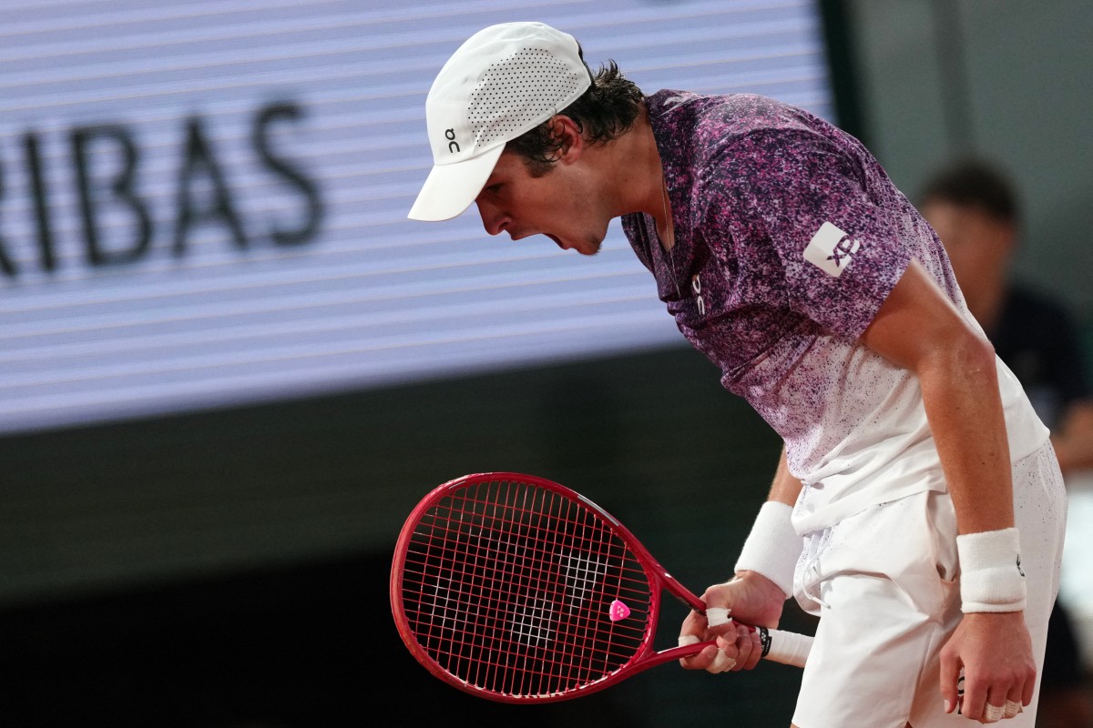 Brazil's Joao Fonseca reacts to a point against Norway's Casper Ruud during their men's singles match.