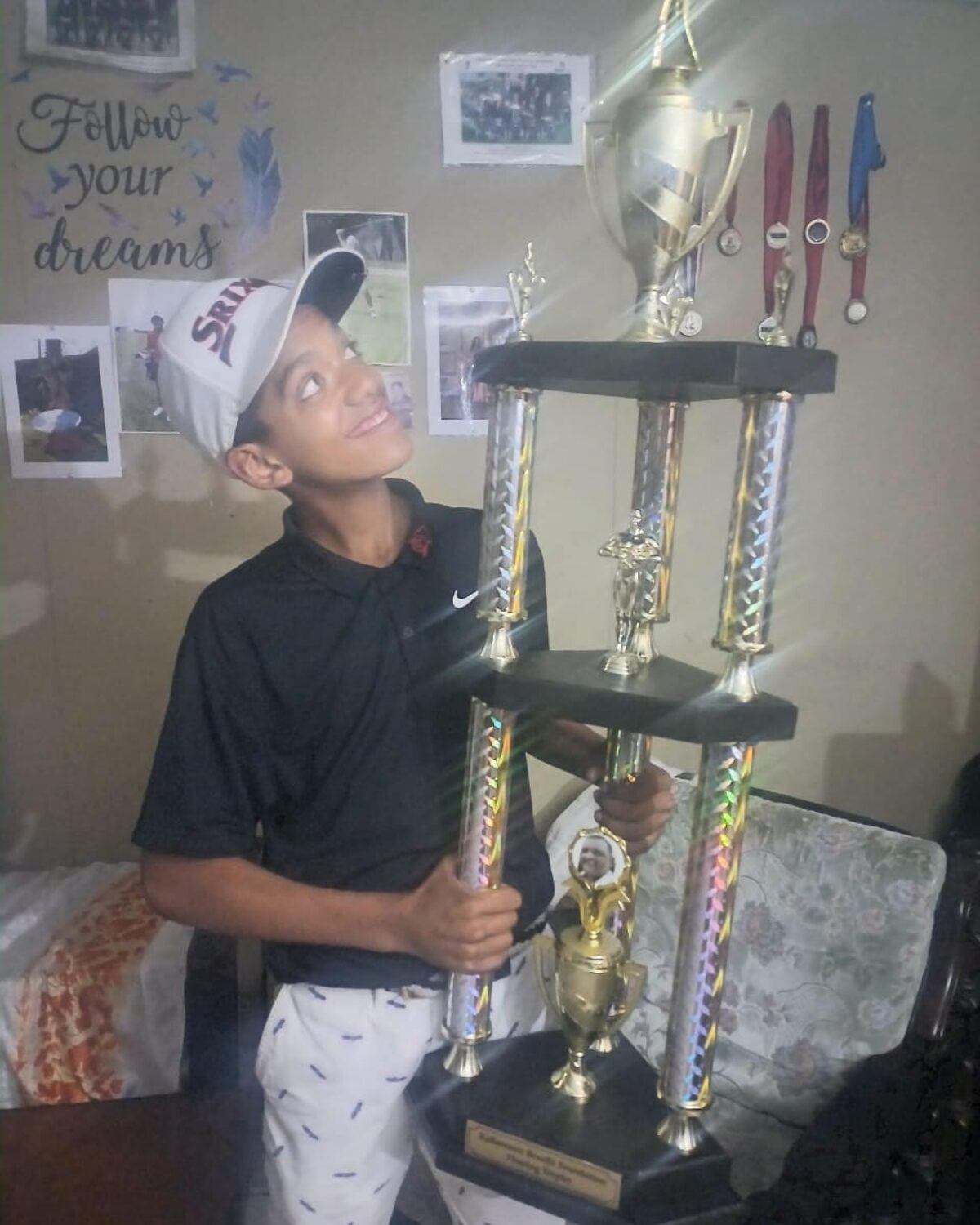 Young golf champion tees up title defence
